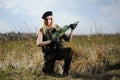 Beautiful army girl with gun Royalty Free Stock Photo