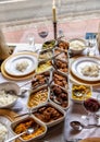 Beautiful arrangement of a variety of Indonesian dishes and rice at a restaurant in Amsterdam, Netherlands