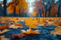Autumn leaves scattered on a park pathway Royalty Free Stock Photo