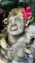 Beautiful artistic Bali stone statue of a Balinese ancient garden statue used as garden decoration, javanese gnome indonesia