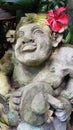 Beautiful artistic Bali stone statue of a Balinese ancient garden statue used as garden decoration, javanese gnome indonesia