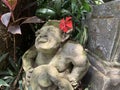 Beautiful artistic Bali stone statue of a Balinese ancient garden statue used as garden decoration, javanese gnome indonesia