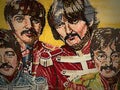 Beautiful artwork-portrait of the popular band The Beatles made of small colored candies