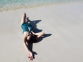 Beautiful Asia woman lie down on beach Royalty Free Stock Photo