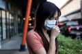 Beautiful asia  Woman suffer from sick and wearing face mask  protect filter against air pollution PM2.5,Air pollution caused Royalty Free Stock Photo