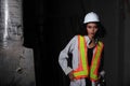 Beautiful Asian Architect Engineer woman in white hard hat