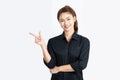 Beautiful Asian Business woman smile and pointing to copy space and thinking get idea with her business start up feeling so happin Royalty Free Stock Photo