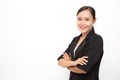 Beautiful Asian business woman wearing black suit with her crossed arms on white background and copy space.  Confident Asian Royalty Free Stock Photo