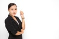 Beautiful Asian business woman wearing black suit with her crossed arms on white background and copy space.  Confident Asian Royalty Free Stock Photo