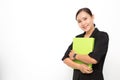 Beautiful Asian business woman wearing black suit holding document folder smiling on  white background and copy space. Confident Royalty Free Stock Photo