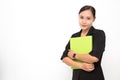 Beautiful Asian business woman wearing black suit holding document folder smiling on  white background and copy space. Confident Royalty Free Stock Photo