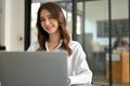 Beautiful Asian businesswoman or female secretary is working in her office Royalty Free Stock Photo