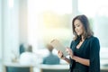 Beautiful businesswoman using tablet in office