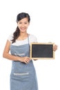 Beautiful Asian cafe owner holding blank sign blackboard Royalty Free Stock Photo