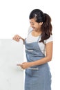 Beautiful Asian cafe owner holding blank white board Royalty Free Stock Photo