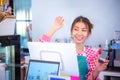 Beautiful asian cashier wearing apron holding a phone with copy space with a cheerful demeanor, Smart technology