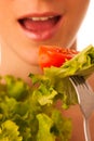 Beautiful asian caucasian woman with a white bowl of mixed salad Royalty Free Stock Photo