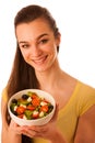 Beautiful asian caucasian woman with a white bowl of mixed salad Royalty Free Stock Photo