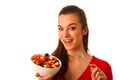 Beautiful asian caucasian woman with a white bowl of mixed salad Royalty Free Stock Photo