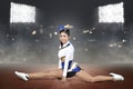 Beautiful asian cheerleader doing splits