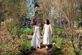 Beautiful Asian couple with with lace wedding LGBT women spent time together in park  homosexual announcement relationship for Royalty Free Stock Photo