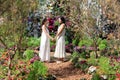 Beautiful Asian couple with with lace wedding LGBT women spent time together in park  homosexual announcement relationship for Royalty Free Stock Photo