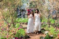 Beautiful Asian couple with with lace wedding LGBT women spent time together in park  homosexual announcement relationship for Royalty Free Stock Photo