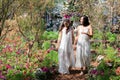 Beautiful Asian couple with with lace wedding LGBT women spent time together in park  homosexual announcement relationship for Royalty Free Stock Photo