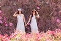 Beautiful Asian couple LGBT women spent time together in park  homosexual announcement relationship in wedding dress for social Royalty Free Stock Photo