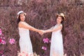 Beautiful Asian couple LGBT women spent time together in park  homosexual announcement relationship in wedding dress for social Royalty Free Stock Photo