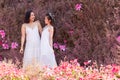 Beautiful Asian couple LGBT women spent time together in park  homosexual announcement relationship in wedding dress for social Royalty Free Stock Photo