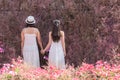 Beautiful Asian couple with wedding dress LGBT women spent time together in park  homosexual announcement relationship for social Royalty Free Stock Photo