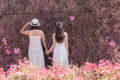 Beautiful Asian couple with wedding dress LGBT women spent time together in park  homosexual announcement relationship for social Royalty Free Stock Photo