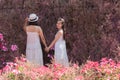 Beautiful Asian couple with wedding dress LGBT women spent time together in park  homosexual announcement relationship for social Royalty Free Stock Photo