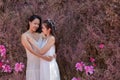 Beautiful Asian couple with wedding dress LGBT women spent time together in park  homosexual announcement relationship for social Royalty Free Stock Photo