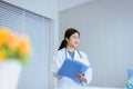 Beautiful asian doctor woman working auscultate or patient examination at hospital Royalty Free Stock Photo