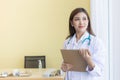 Asian female doctor smiling. Royalty Free Stock Photo