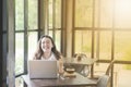 Beautiful Asian girl celebrate with laptop, success happy pose. E-commerce, university education, internet technology, or startup Royalty Free Stock Photo