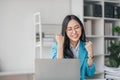 Beautiful Asian girl celebrate with laptop, success happy pose. E-commerce, university education, internet technology Royalty Free Stock Photo