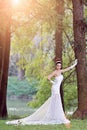 Beautiful Asian girl in a wedding dress showing happy moments