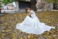 Beautiful Asian girl dressed in white dress