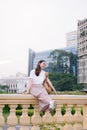 Beautiful asian girl is having a rest outdoors Royalty Free Stock Photo