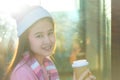 Beautiful asian girl holding a cup of coffee and smile Royalty Free Stock Photo