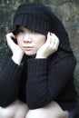 Beautiful Asian girl with a hood Royalty Free Stock Photo