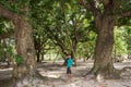 Beautiful asian girl inside tropical forest