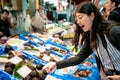 Beautiful asian girl looking for fresh food.