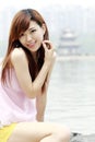 Beautiful Asian girl outdoors Royalty Free Stock Photo