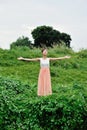 Beautiful asian girl playing in the grass