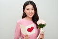 Beautiful asian girl reads love letter. Happy woman day. Royalty Free Stock Photo