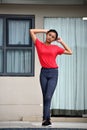 Serious Beautiful Asian Girl Standing By Condo